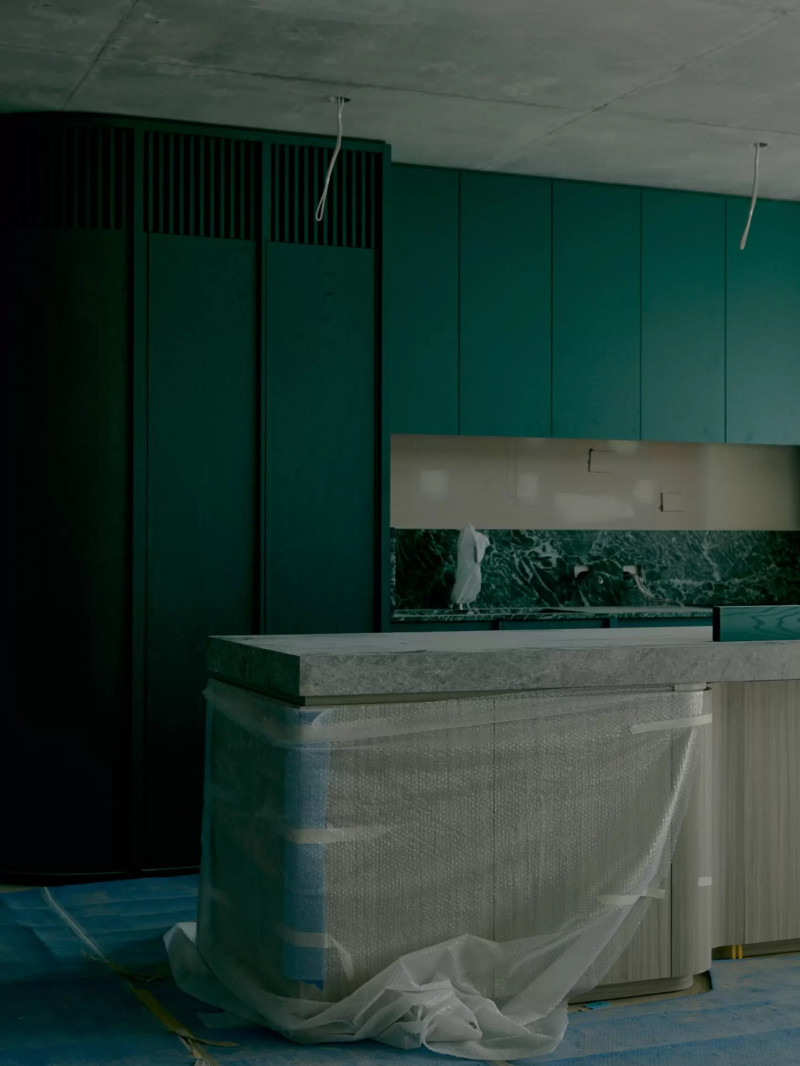 Green kitchen during construction